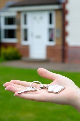 house keys in the palm of hand